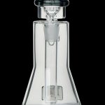 Clear glass dab rig with intricate design and angled mouthpiece.