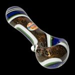 Glass pipe with gold glitter and blue and green stripes against a black background.