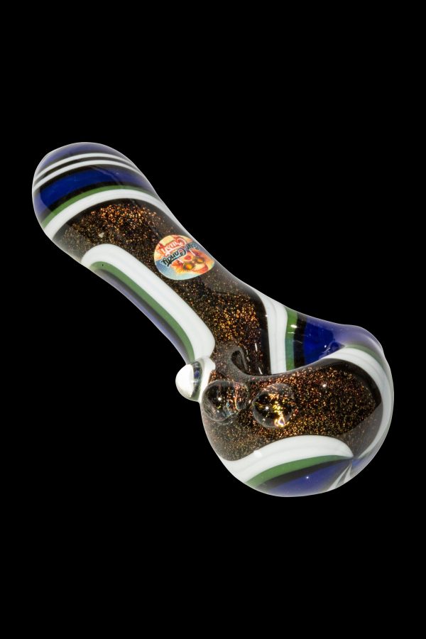Glass pipe with gold glitter and blue and green stripes against a black background.