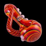 Red and white glass cannabis water pipe with swirling patterns.