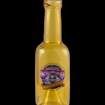 A vintage glass oil bottle labeled “Headdy Glassworks Est. 1996” with colorful psychedelic graphics.