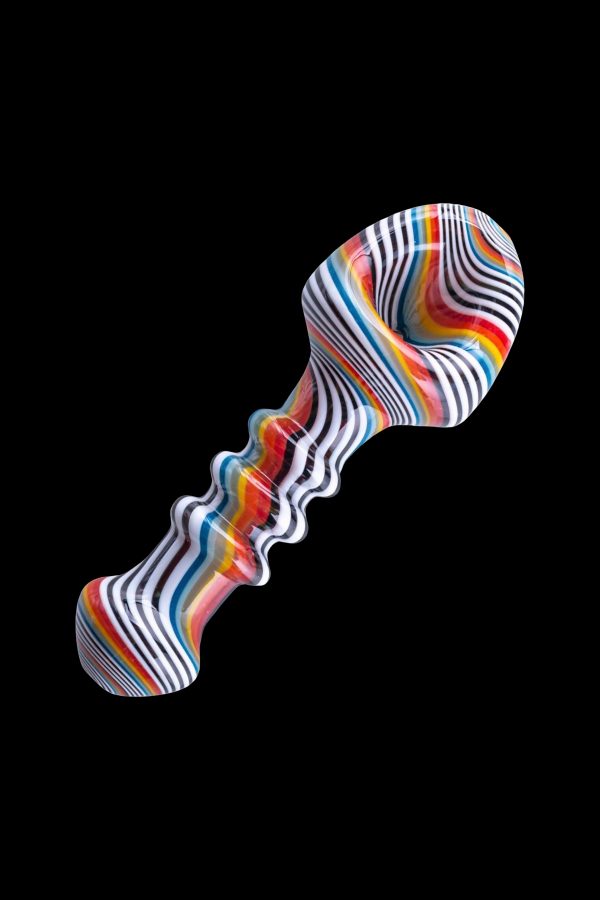 Colorful glass pipe with swirling stripes and a uniquely shaped bowl, isolated on a black background.