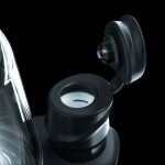 Close-up of a sleek, black cannabis oil vape pen cartridge with an open mouthpiece.