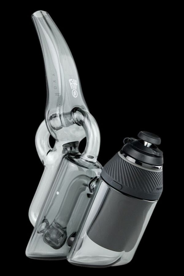 A translucent gray cannabis water pipe (rig) and electronic vaporizer (e-nail) set against a black background.