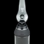 Black Puffco Peak Pro portable dab rig with glass water pipe attachment.