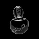 Black glass cannabis oil rig with branding.