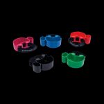 Colorful, modular cannabis accessory organizers displayed against a black background.