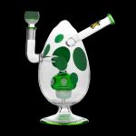 Green and white glass water pipe shaped like an egg with a clear mouthpiece and stem.