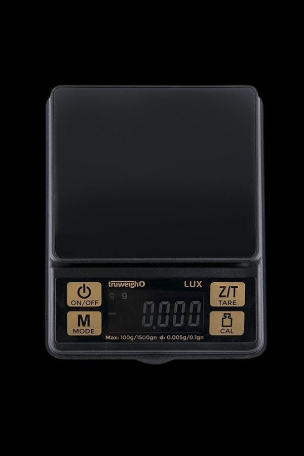 Digital scale displaying 0.000g, used for measuring cannabis.