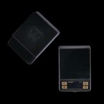 Black digital scale with a reflective surface, often used for measuring cannabis.