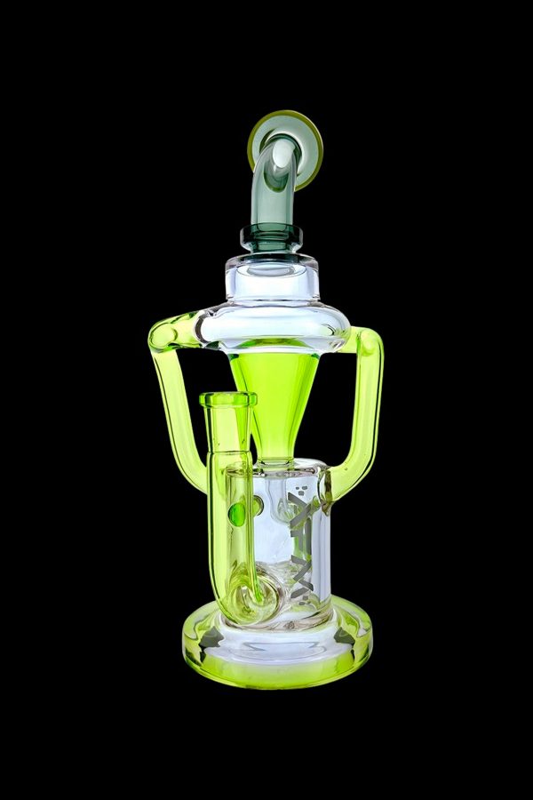 A vibrant green glass dab rig with intricate curves and a percolator, isolated on a black background.