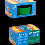 A closed, colorful cardboard box for a "Tree House Ash Tray" with instructions on how to attach it to glass smoking equipment.