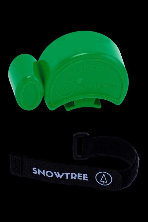 Green silicone case for a cannabis pipe or similar smoking device, with a black branded strap.