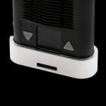 Close-up of the base of a sleek, black cannabis vaporizer with white accents and control buttons.
