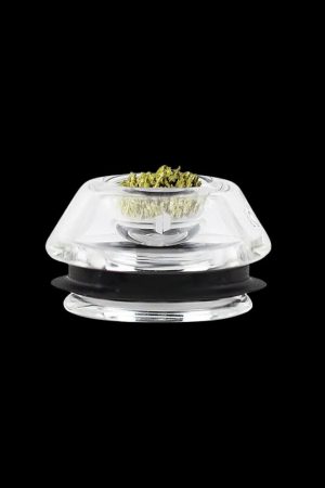 Clear glass bubbler filled with cannabis flower.