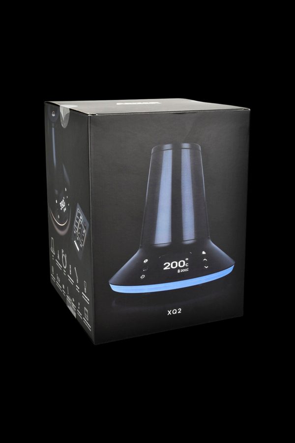 Black box for a cannabis concentrate vaporizer, displaying a digital temperature control interface and product name "XQ2."