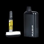 Black cannabis vape pen and cartridge with visible oil.