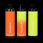 Three Pulsar vaporizers in orange, yellow, and lime green, with voltage settings displayed on the base.