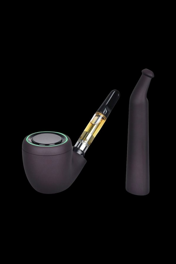Sleek black cannabis oil vaporizer resembling a pipe, with a partially visible cartridge and mouthpiece against a dark background.