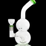Clear glass bubbler with green accents, used for smoking cannabis.