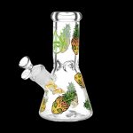 Glass bong decorated with colorful pineapple and alien designs.