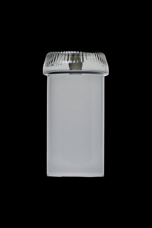 Clear glass cannabis storage jar with screw-on lid.