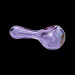 Purple glass pipe with colorful decal against a black background.