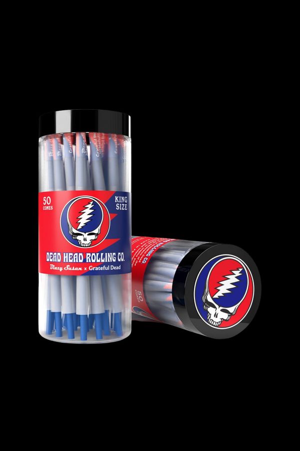 Blue tube of 50 pre-rolled cones and a matching container branded with the iconic Grateful Dead "Steal Your Face" skull logo, advertising "Dead Head Rolling Co." cannabis accessories.