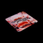 Close-up of a patterned rolling tray with the text “Thank You For Smoking With Us.”