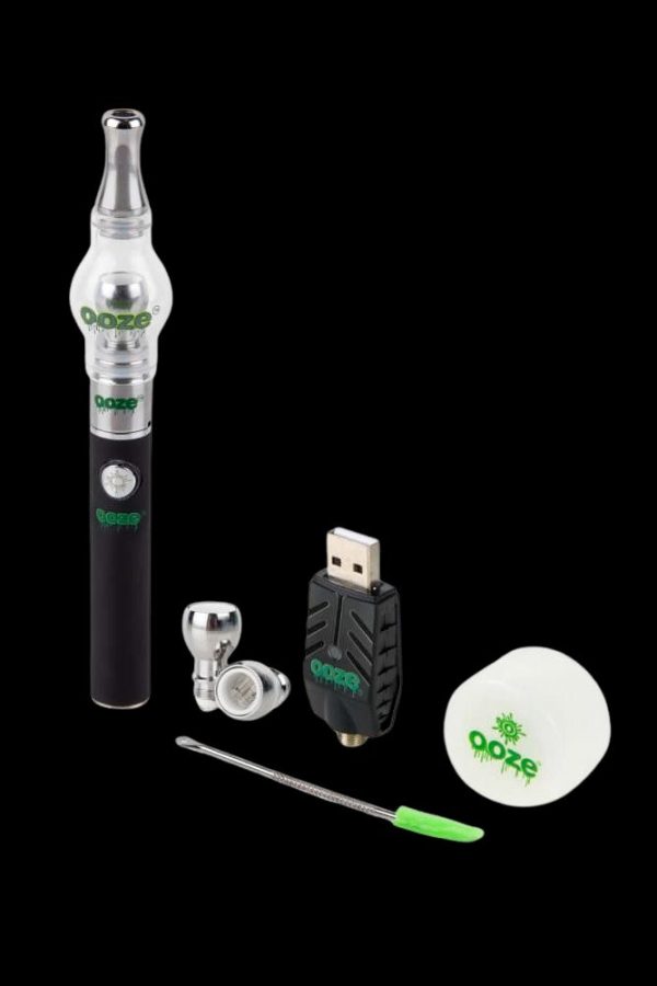 Ooze cannabis vape pen kit with charging accessories and tools.