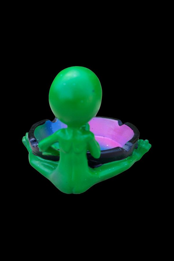 Green alien-shaped ashtray with a purple and black speckled dish.
