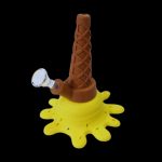 Glass water pipe shaped like a melting ice cream cone with a clear glass bowl.