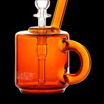 Orange glass bubbler with a handle and removable downstem.