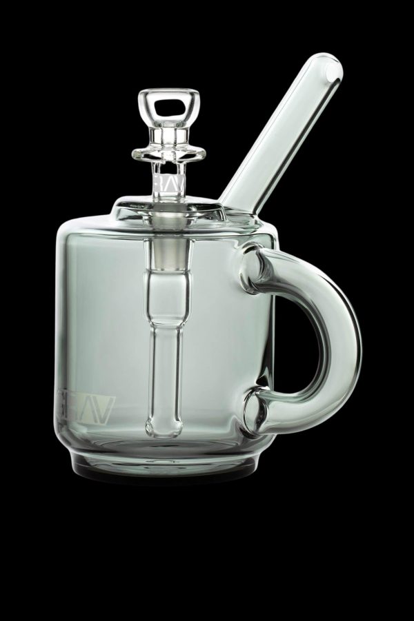 Green glass rig with a handle and mouthpiece, designed for concentrated cannabis use.