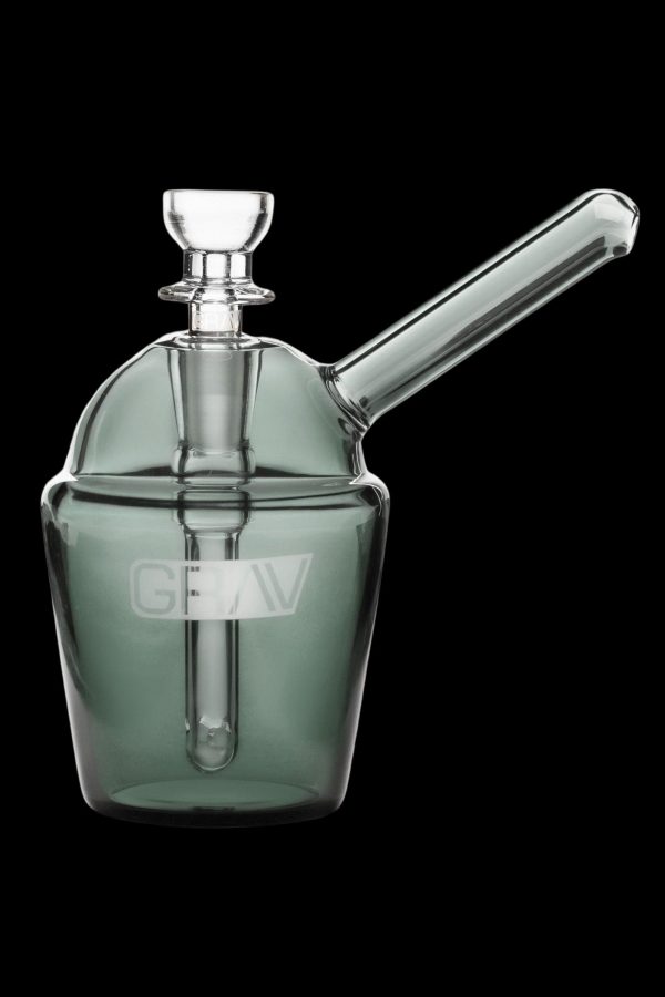 Green glass bubbler with a clear glass mouthpiece and bowl.