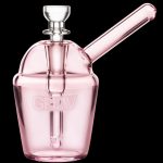 Pink glass bubbler with a cylindrical mouthpiece and intricate internal diffusion.