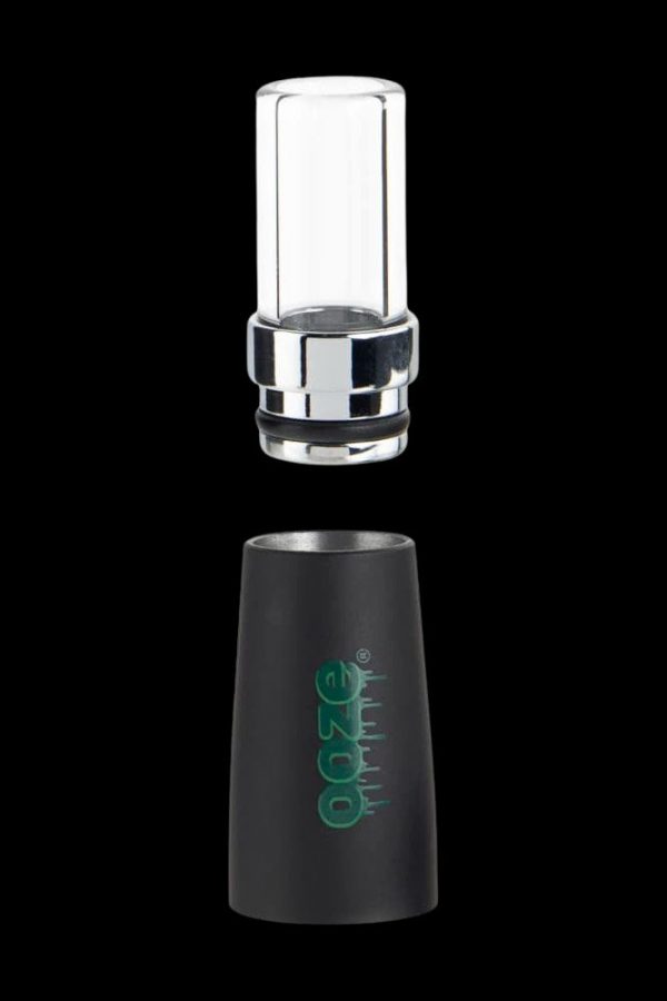 Black and clear glass oil rig dab attachment with green logo.