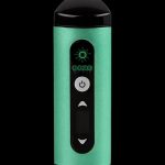 Green Ooze pen-style vaporizer with digital display and control buttons.