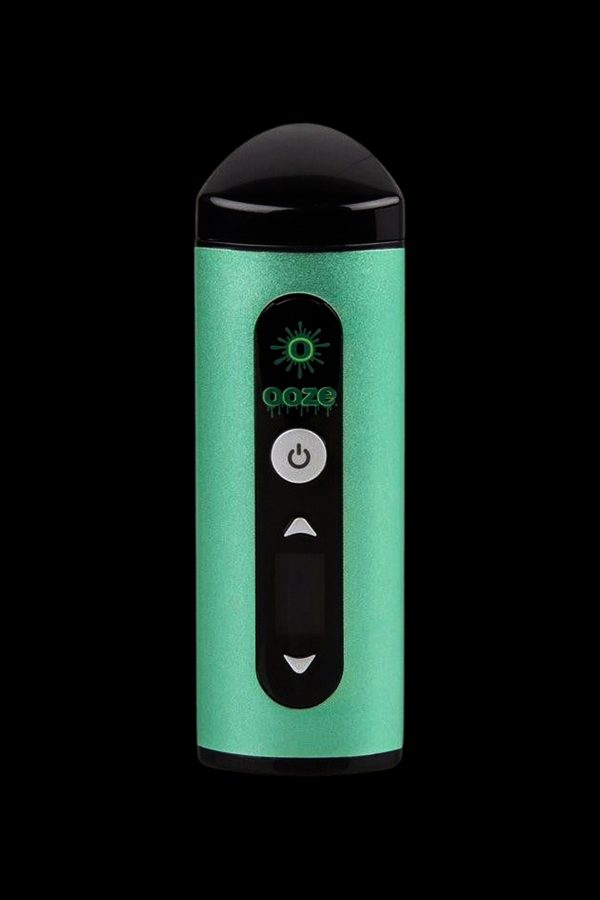 Green Ooze pen-style vaporizer with digital display and control buttons.