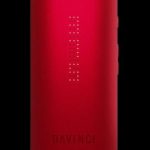 Red Davinci vaporizer with illuminated dots, displaying the brand name.