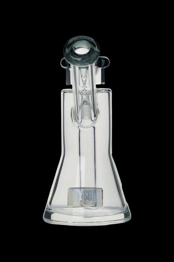 Clear glass rig with intricate design and bubbler mouthpiece.