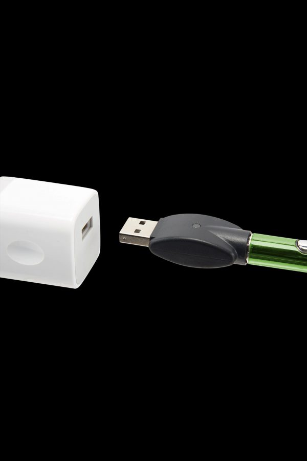 Cannabis vape pen charging via USB.
