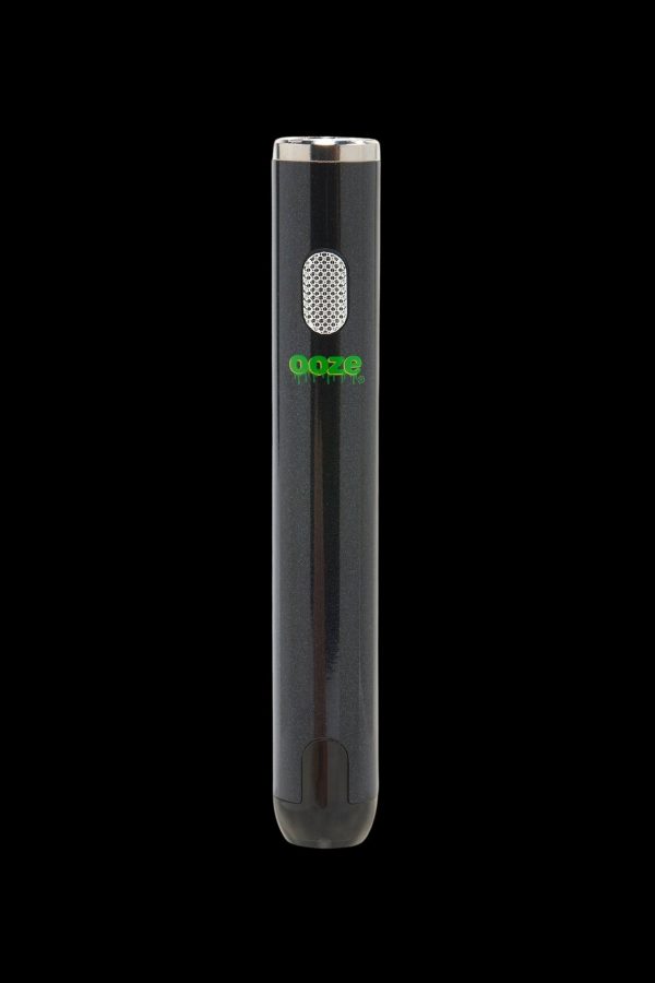 Black Ooze vape pen with green branding against a dark background.