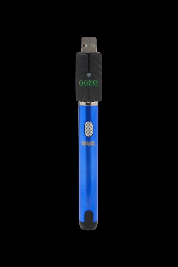 Blue Ooze vaping pen with USB charger.