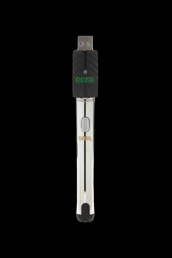 Sleek, portable Goze dab pen with USB charging port and transparent body.