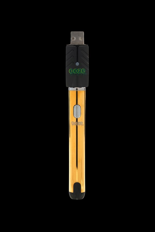Sleek black and gold Goze portable dab rig with USB charging port.