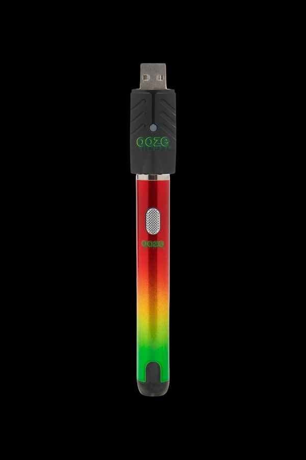 Ooze pen-style vape battery with USB charger, red and green gradient.