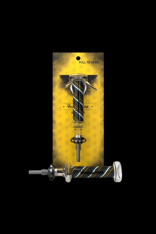 A packaged cannabis oil burner with a patterned yellow and black background.