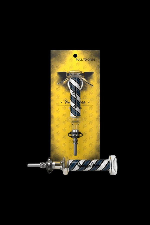 A glass cannabis dab straw with a black and white swirl design, packaged in a gold patterned box.