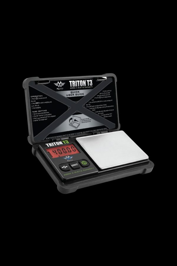 Digital scale with an open cannabis container, displaying a weight reading.